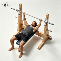 Nouveau design : Banc de musculation inclinable professionnel avec support de sécurité pour haltères et barres plates en bois