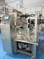 Machine de remplissage et de scellage automatique rotative YH pour sachets préformés à fermeture éclair Doypack pour aliments et boissons