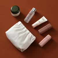 Vente en gros d'usine de styliste de luxe avec logo personnalisé nouvelle mini pochette rose en cuir PU trousse de toilette de maquillage cosmétique de voyage