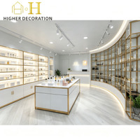 Meubles de présentation de magasin en or à grille légère et luxueuse, présentoir cosmétique, comptoir de présentation cosmétique