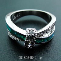Bague de mariage et de fête en argent sterling 925 plaqué or blanc et rhodium avec opale de feu et CZ en croix