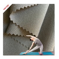 Tissu Lyc-raStretch en nylon à haute teneur en spandex pour maillots de bain de vêtements de sport Jacquard en polyester tissé avec une caractéristique imperméable pour les costumes de yoga