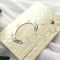 Carte d'invitation de mariage pliée en relief avec crème, nœud en strass et cadre ajouré, vierge, pour événements, prix de gros