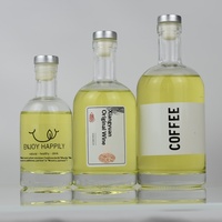 Botol Minuman Keras Kaca Buram Bulat Custom 100ml-1000ml dengan Tutup untuk Kemasan Vodka Whisky Brandy Cina