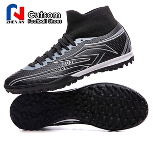 Venta al por mayor de fábrica: Zapatillas de fútbol personalizadas transpirables de caña alta TF con tacos, ideales para entrenamiento y partido, esenciales para aficionados. - Product Image 2