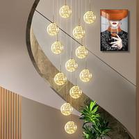 Lustre suspendu en verre LED de luxe nordique pour escalier et maison duplex, design minimaliste moderne de style long