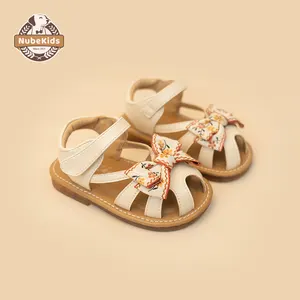 Nouveau style d'été Sandales d'extérieur pour enfants et filles Chaussures de plage à semelle souple avec décoration avec nœud papillon