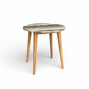 Découvrez le charme intemporel de la table ronde Fik Gap, confectionnée en teck rustique 70x70x75 CM, pour une ambiance cosy et naturelle. - Product Image 1