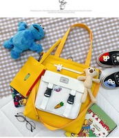 Nouveau design, vente en gros, grands sacs à bandoulière pour étudiant, sac d'école, jolie fille, sac fourre-tout en toile avec porte-crayon, sac à main