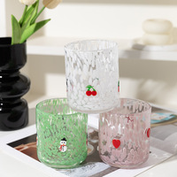 Bougie en verre soufflé à la bouche avec motif de points blancs faits à la main pour la décoration de Noël et la mise en place de la table de fête