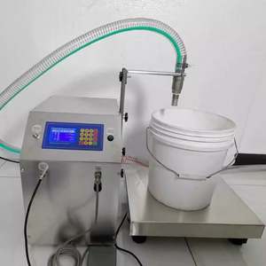 Machine de remplissage automatique quantitative de détergent liquide à grand débit, type pesage - Product Image 6