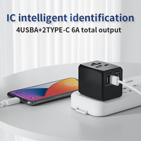 HHT-904 Adaptor Perjalanan Universal All in One dengan 4 USB+2 Tipe C untuk Perjalanan di Semua Negara