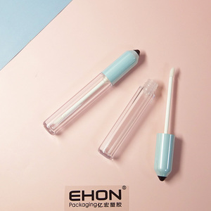 การออกแบบใหม่โปร่งใสรูปร่างที่ไม่ซ้ํากันหลอดลิปกลอสกระสุนดินสอรูปร่างด้านบนขายส่งโลโก้ที่กําหนดเองสีหลอดกลม - Product Image 3