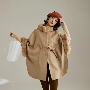 Ropa de invierno con doble botonadura para mujer, abrigo de piel Real recortado, chaqueta de longitud larga, abrigos de lana de Cachemira