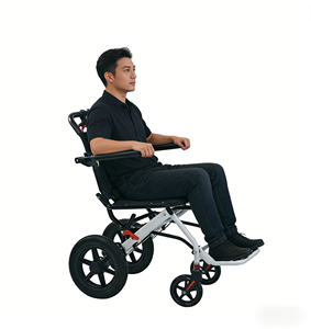 Fauteuil roulant pliable de voyage en acier carbone ultraléger |   Fauteuil roulant portable pour avion <span class=keywords><strong>avec</strong></span> accoudoirs rabattables et roues en PVC de 12 pouces - Product Image 2