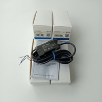 Sensor Amplifier Serat Optik E3X-NA41 PNP Kabel 2M Penyesuaian Manual Sensor Fotoelektrik LED Merah Baru Dalam Kotak