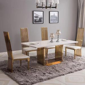 Ensembles table à <span class=keywords><strong>manger</strong></span> en marbre rectangle de luxe table moderne en acier inoxydable doré avec chaises pour <span class=keywords><strong>salle</strong></span> à <span class=keywords><strong>manger</strong></span> de mariage lot de 6 sièges - Product Image 1