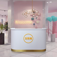 Meubles de salon de beauté de haute qualité, comptoir de réception médical, comptoir de réception luxueux blanc et or pour hôtel et spa