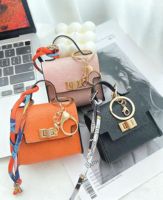 Tas Mini Fashion Terlaris Bahan Kulit PU Multi Warna Gantungan Kunci Tas Liontin untuk Wanita Penyimpanan Kunci Mobil Headphone Lipstik Sebagai Hadiah