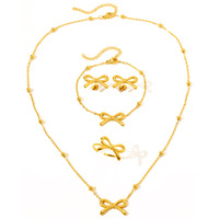 Parures de bijoux en acier inoxydable, design exquis avec nœud, collier, bracelet, bague, boucles d'oreilles, parures de bijoux pour femmes, bijoux tendance, lot de 4