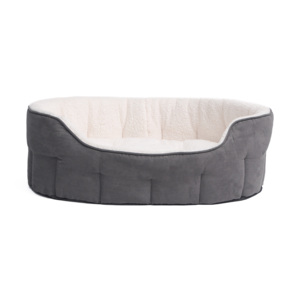 Camas para perros de lona grandes y duraderas diseñadas para soportar elementos exteriores al tiempo que brindan comodidad y resistencia a las mascotas - Product Image 1