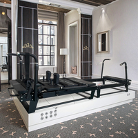 Lit de Pilates Reformer avec logo personnalisé pour l'entraînement personnel, avec ressorts de tension allemands et housse de tapis résistante aux déchirures