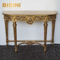 Table console baroque en or antique, cadre en PU sculpté à la main avec finition en feuille d'or et plateau en bois, table élégante pour maisons de luxe