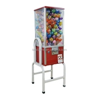 Distributeur de jouets à monnayeur : bonbons, balles rebondissantes, capsules et autres jouets