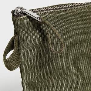 กระเป๋าเครื่องสำอางผ้าแคนวาสพับได้แบบพกพาสำหรับผู้หญิง สีพื้น มีซิป เป็นมิตรกับสิ่งแวดล้อม เหมาะสำหรับการเดินทาง - Product Image 2