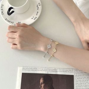 Dylam Jewelry S925 Silver Fine Fashion Link Chain Multiple Crushed Iced Surface Lucky <b>Clover</b> Pendant 5A CZ Tail Pendant <b>Bracelet</b> - Product Image 2