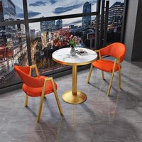Ensemble table et chaises de négociation compactes de luxe nordique pour bureaux de vente modernes, salons de thé, maisons et tables à manger simples