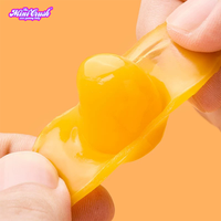 Bonbons pelés Bonbons gommeux Saveurs mélangées Saveur de mangue et collations sucrées en forme de mangue