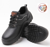 Chaussures de sécurité classiques pour hommes en cuir grainé noir confortables avec embout en acier, respirantes, idéales pour l'usine et la construction (modèle bas)