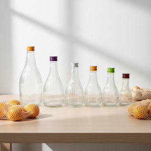 <span class=keywords><strong>Botellas</strong></span> <span class=keywords><strong>de</strong></span> Vidrio Transparente <span class=keywords><strong>de</strong></span> Grado Alimenticio con Rayas Horizontales, <span class=keywords><strong>de</strong></span> 100ml a 700ml, con Tapa Metálica <span class=keywords><strong>de</strong></span> Rosca para Jugos y Bebidas - Product Image 1