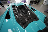 Kit carrosserie en fibre de carbone sèche pour Lamborghini Revuelto, comprenant : lèvre avant, jupes latérales, diffuseur, spoiler et cache-moteur (compatible OEM Revuelto)