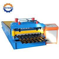 Machine de formage à froid pour tôles de toiture métalliques, machine de formage à froid pour panneaux de toiture vitrés