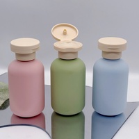 Flacons cosmétiques ronds en plastique givré de 100 ml avec bouchon à clapet pour lotion