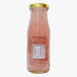 Bebida de granada y aloe vera en botella de Patanjali, alta en vitamina C, extracto de fruta de calidad alimentaria. - Product Image 2