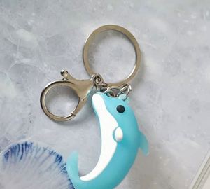 Wholesale Cute <b>Cartoon</b> Rubber Dolphin Keychain Marine Animal Pendant Student <b>Backpack</b> Decoration Car Keychain - Product Image 5