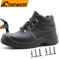 Chaussures de sécurité de chantier pour hommes, en cuir noir, avec embout en acier, anti-perforation, anti-écrasement, semelle antidérapante en PU, économiques