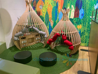 Fauteuil œuf en bois moderne Chiquitos pour enfants, idéal pour les coins lecture des bibliothèques scolaires, avec un design en forme d'oignon