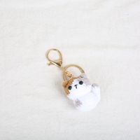 Porte-clés en peluche au crochet fait main, motif chien et fleur, pendentif tricoté avec clochette, ornement de sac en laine douce, cadeau portable et durable