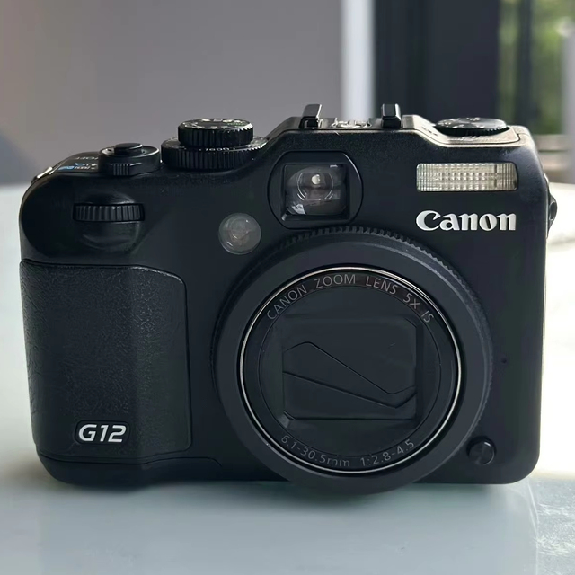 Good Condition for Power-Shot G12 10.0 MP High-Sensitivity CMOS Sensor 5x Optical Zoom SD Compatible Camera