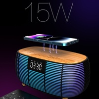 Nouvelle Enceinte Karaoké Multifonctionnelle Exclusive Transfrontalière avec Son Hi-Fi V5.3, Recharge Sans Fil, Horloge et Alarme de Bureau