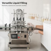 Machine de remplissage de parfum automatique à quatre têtes rotatives avec trémie, remplisseuse de liquides sous vide pour petites bouteilles