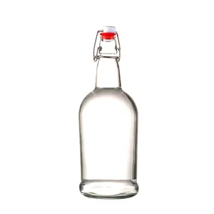Venta al por mayor caliente de encargo de oscilación superior redonda 250ml 500ml 8 oz 16 oz 32 oz Flip top de vidrio transparente botellas de Kombucha para Kombucha