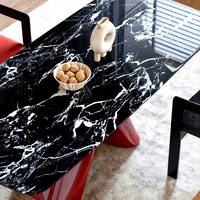 Table de salle à manger rectangulaire sur mesure en marbre noir brillant avec support en acier inoxydable pour restaurant