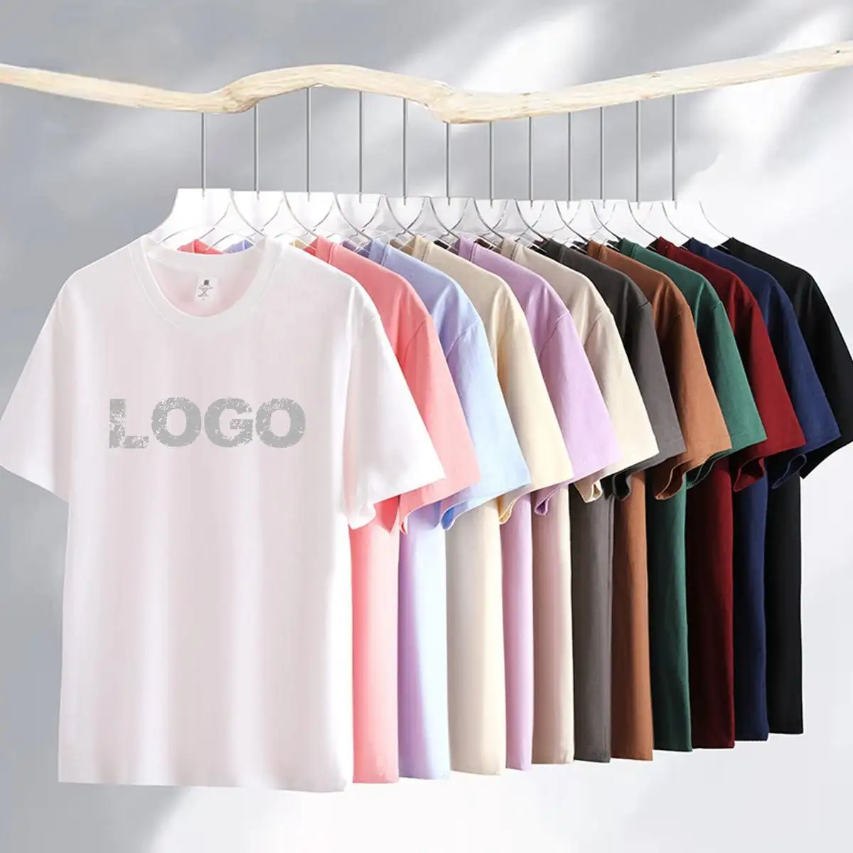 Oferta muestra gratis personalizada de alta calidad color sólido 200gsm espacios en blanco de algodón impreso liso cuello redondo Camiseta gráfica camisetas