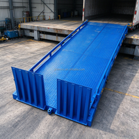 Rampe de conteneur en promotion : Niveleur de quai mobile réglable en acier haute résistance avec rampe hydraulique pour entrepôt/chariot élévateur
