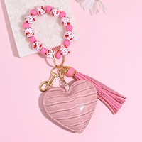 Porte-clés bracelet imprimé léopard avec perles, pendentif cœur et étoile en cuir PU, breloque de sac à pompon, accessoires pour poignet